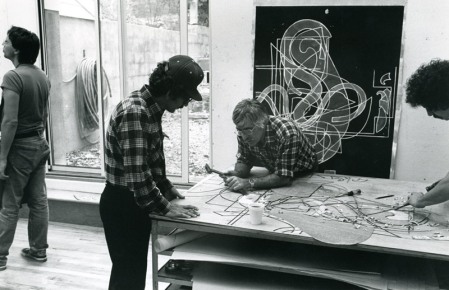 Kenneth Tyler and Bob Cross carve a woodblock in preparation for magnesium plate to be inserted for Frank Stella's 'Pergusa three', from the 'Circuits' series, Tyler Graphics Ltd., Bedford Village, New York, 1981. Photo: Lindsay Green. National Gallery of Australia, Canberra